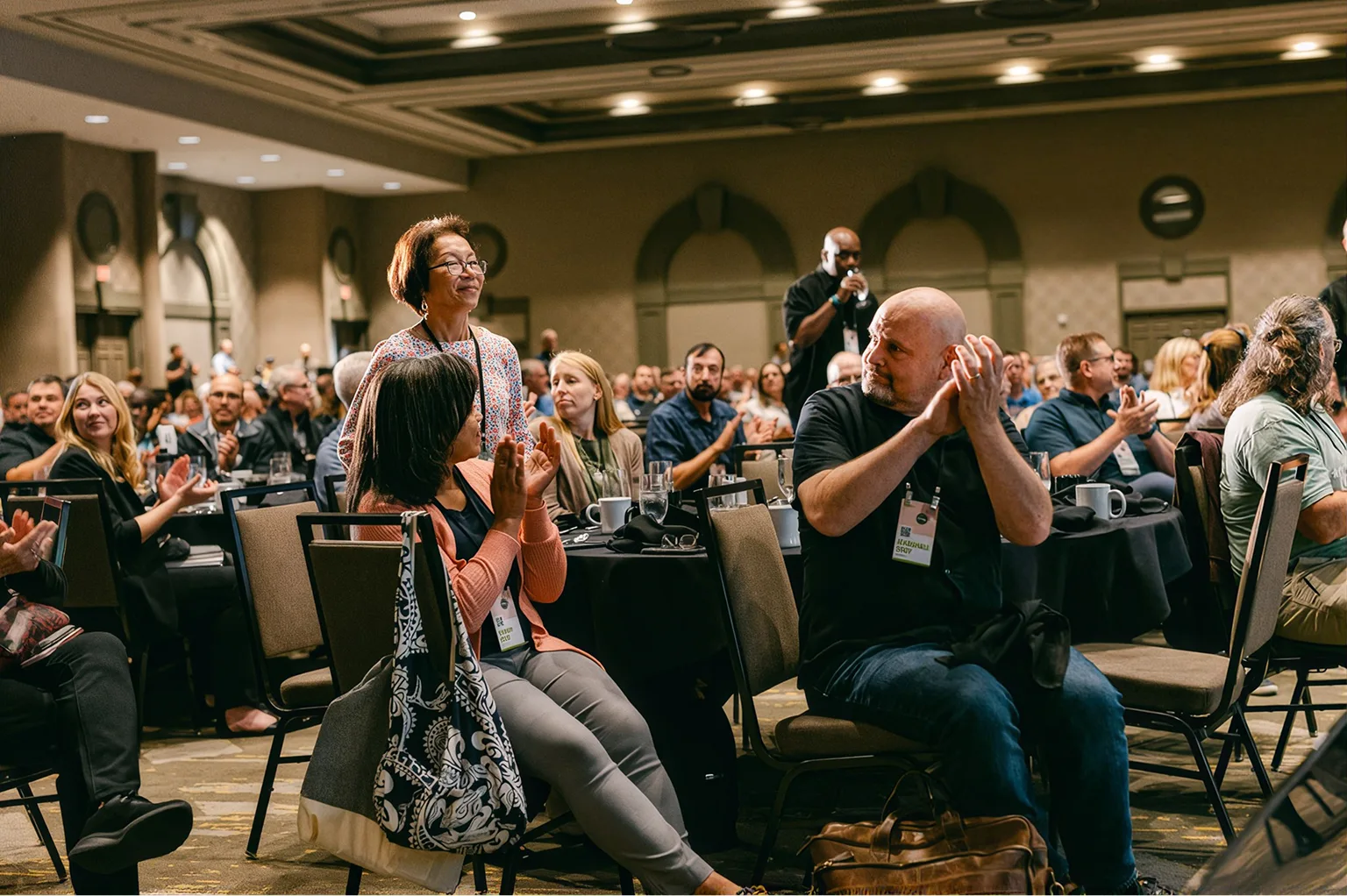 Conference audience applauding